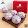 Bộ hũ đựng mứt sứ dáng bí men tím hồng in logo Techcombank