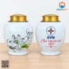 Hũ đựng trà EVN màu trắng họa tiết hoa và lời chúc năm mới 2027