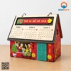 Lịch gỗ để bàn hình ngôi nhà với dòng chữ Tết là để về nhà